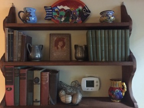 Mom's books now displayed in our downstairs hallway. 
